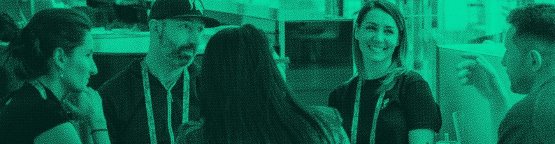 Colleagues talking together at an industry event