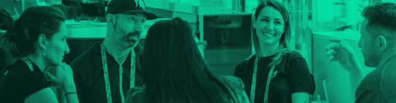 Colleagues talking together at an industry event