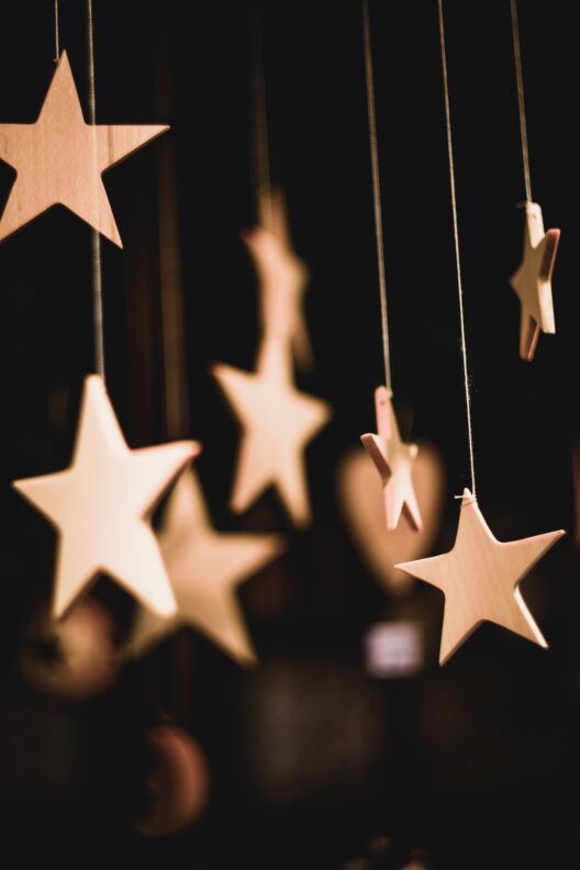 Hanging wooden stars in warm lighting